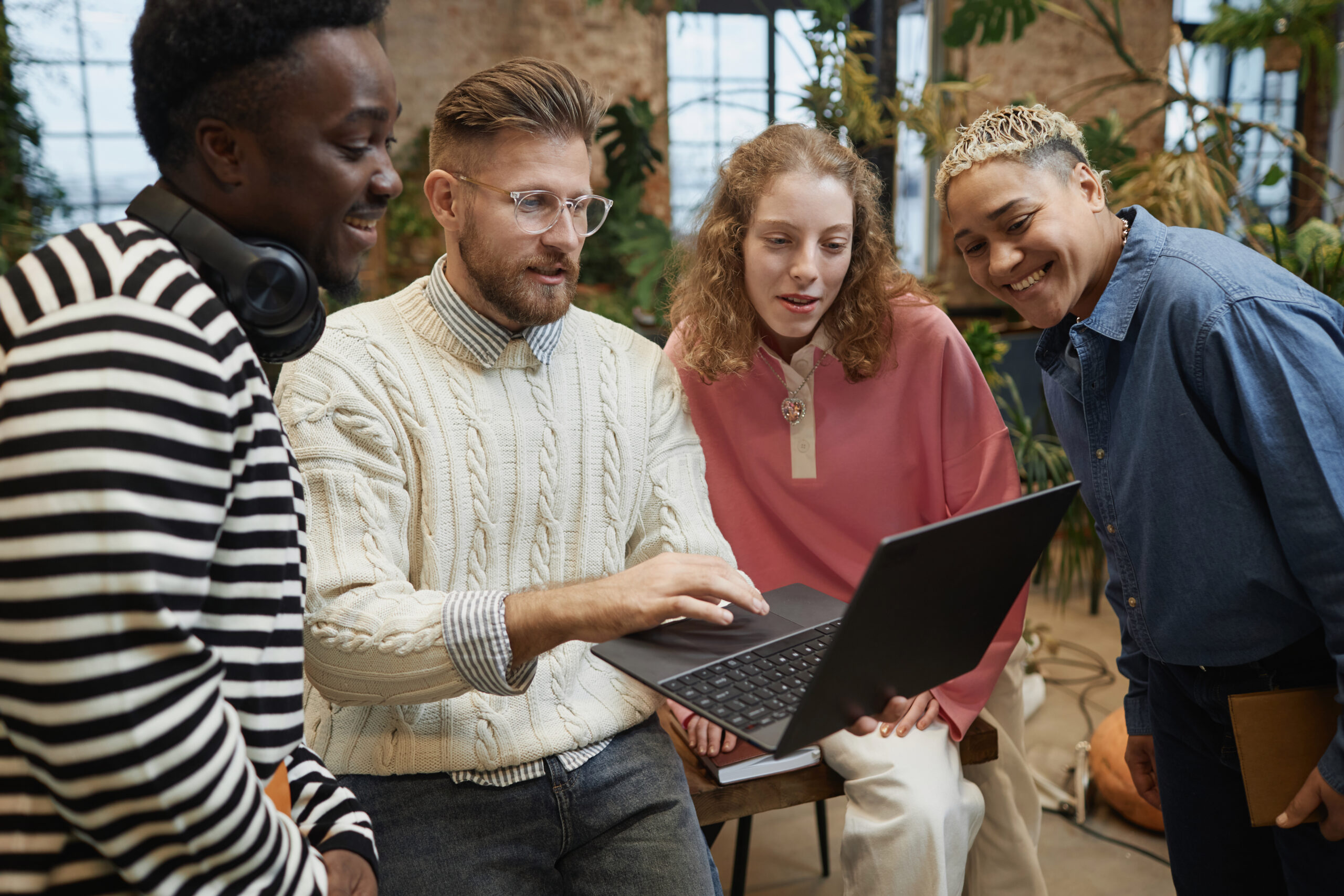 Business team looking at a laptop screen